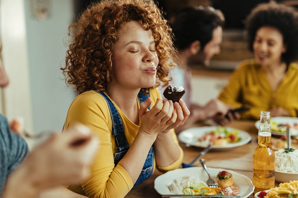woman eating mindfully and savoring food