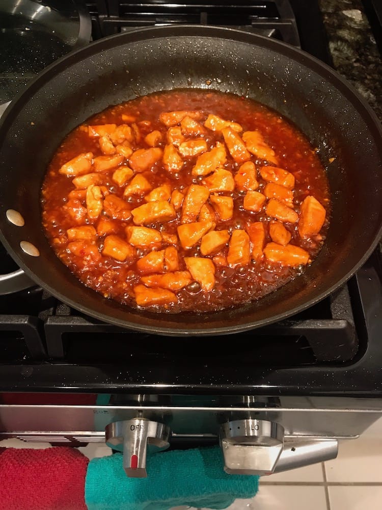 finished orange chicken with thickened sauce